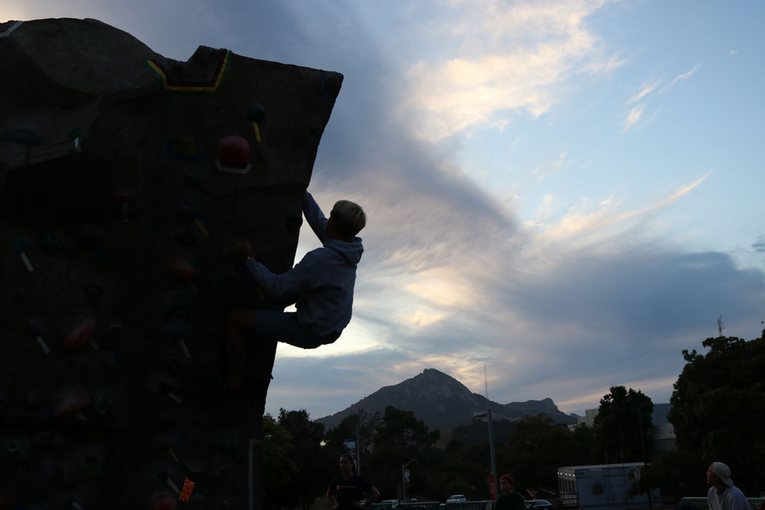 Naturally, when I returned back at the walls a half-hour before the closing time of 7:00 p.m., the chill in the air still didn’t stop the group of 13 climbers from putting on their shoes and chalking up for another route. / Oct. 16, 2019 / The Poly Escapes climbing park