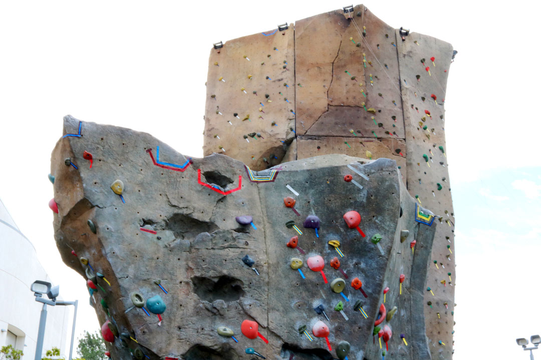 The Poly Escapes outdoor climbing park, located by the Recreation Center, features two rock walls for bouldering and belaying, free of charge for all Cal Poly students and Recreation Center members. / Oct. 16, 2019 / The Poly Escapes outdoor climbing park