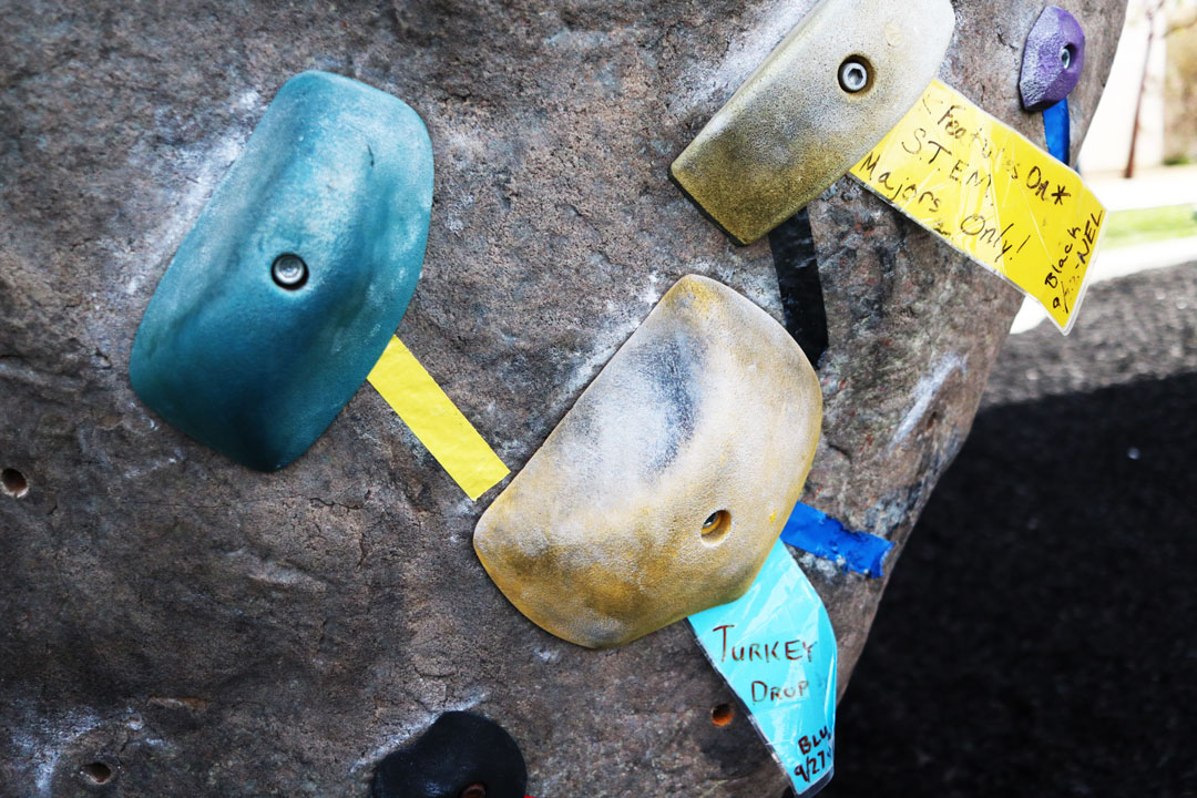 The tags, while functional, also add some fun to the wall, labeled with names like “Heel of Fortune” or “Turkey Drop,” seasonally named by the wall’s staff. / Oct. 16, 2019 / The Poly Escapes  outdoor climbing park